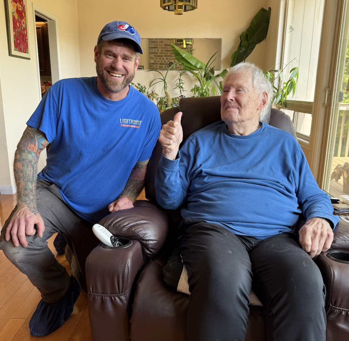 Lighthouse Plumbing technician with a longtime Eastside customer